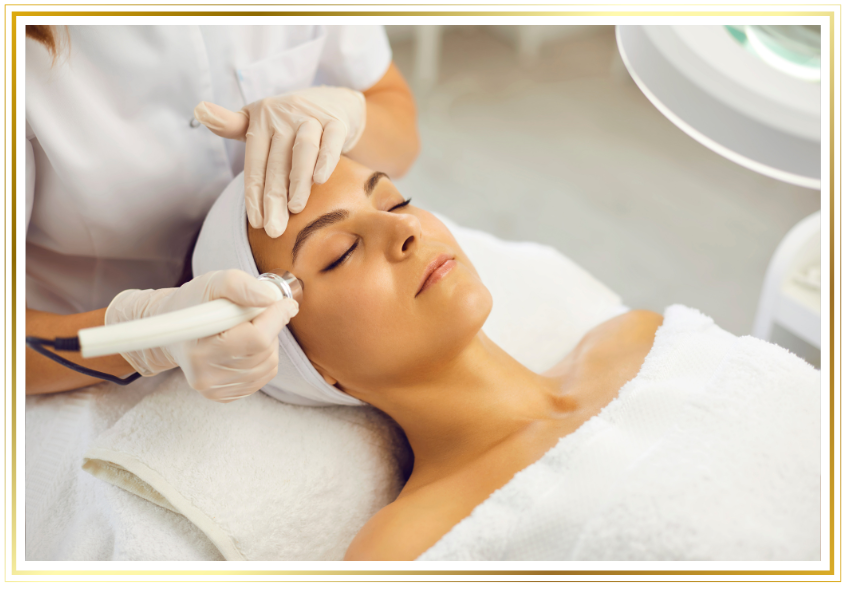 a woman receiving a facial massage